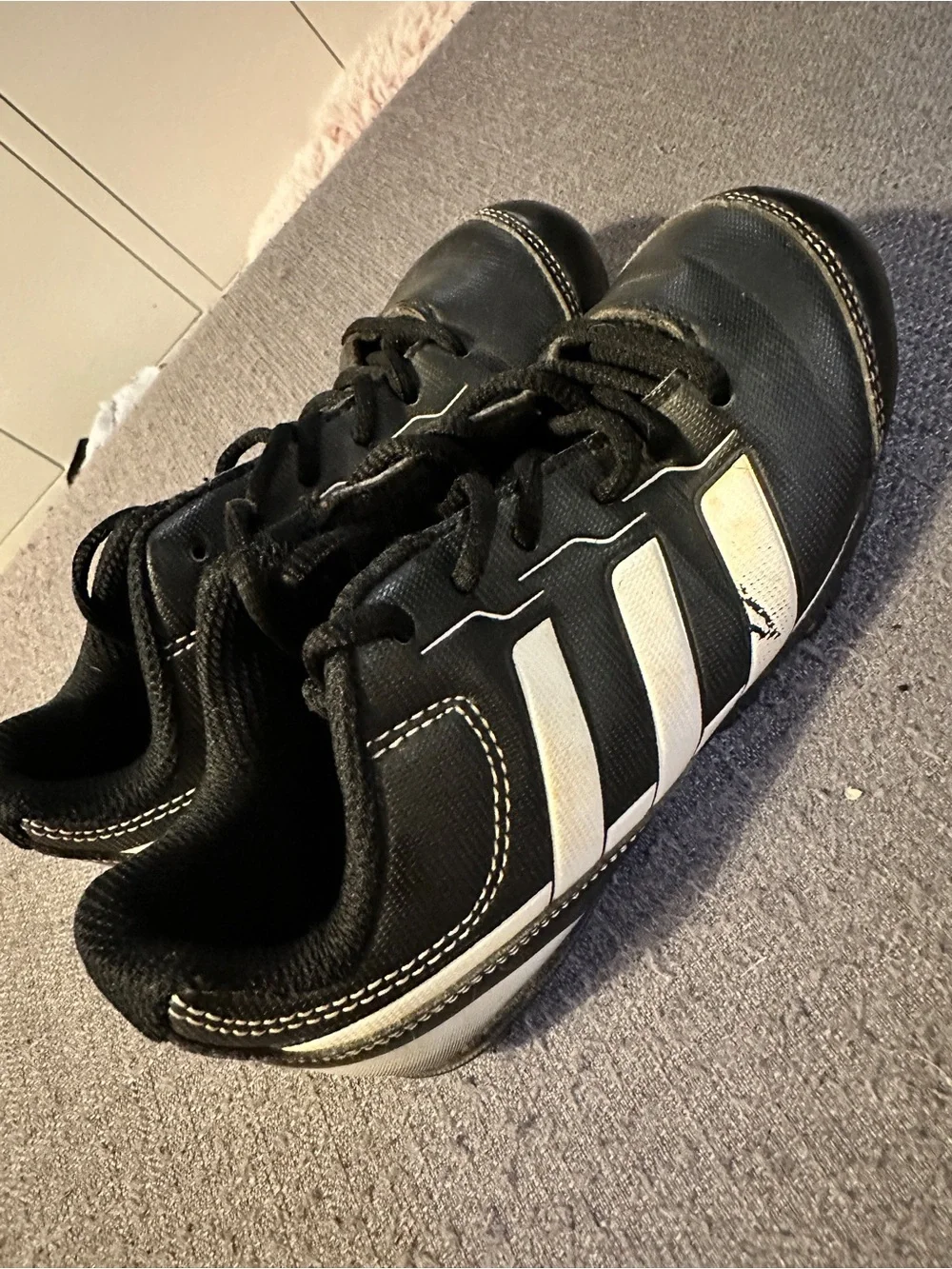 adidas kids Black Athletic Sneakers with White Stripes